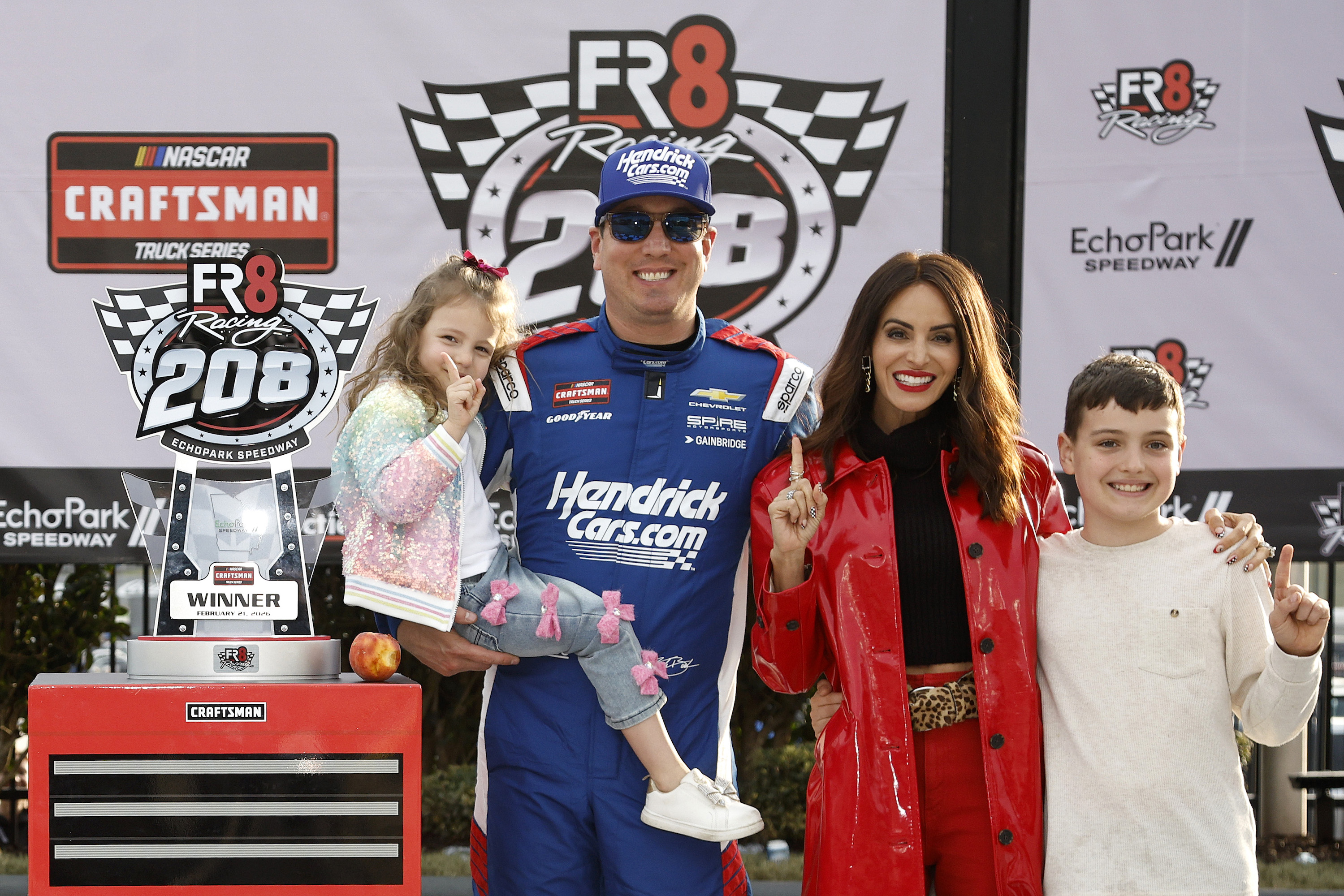 GettyImages-2262864226Kyle-Buschs-Widow-Samantha-and-Son-Brexton-Honor-Late-NASCAR-Driver.jpg